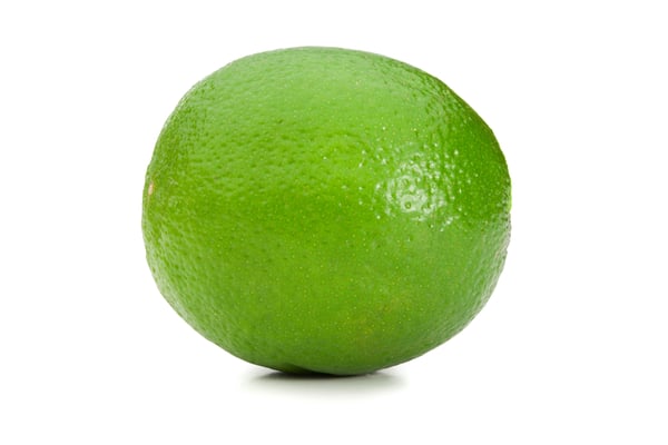 Green lemon on a white background